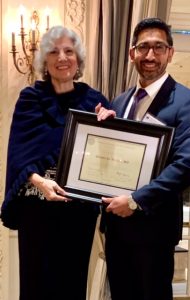 Dr. Diane LoRusso recieving Citation recognizing her 50 years in medicine from Westchester County Medical Society’s President Omar Syed at the society's 2019 Annual Meeting